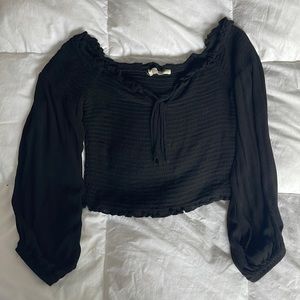 Black cinched crop top with balloon sleeves